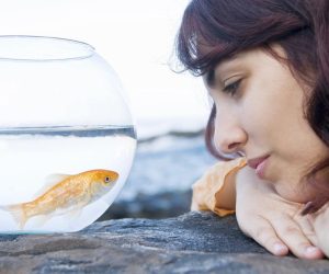 Woman calming her body through vagus nerve stimulation, easing stress with awe and gratitude